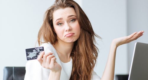 Woman who seams dis-concerned about a balance transfer credit card